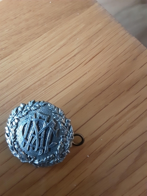 [Badge Image]