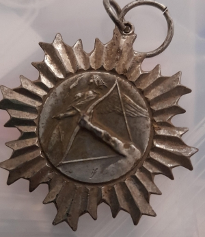 [Badge Image]