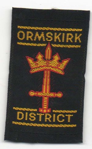 [Ormskirk District District Badge]