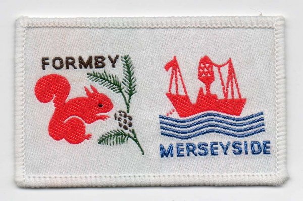 [Formby @ District Badge]