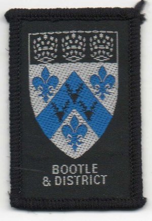 [Bootle & District District Badge]