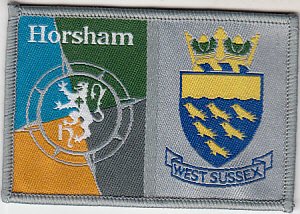 [Horsham District @ District Badge]