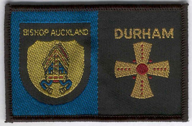[Bishop Auckland @ District Badge]