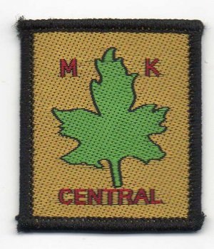 [M. K. Central (Milton Keynes) District Badge]