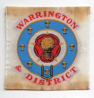 [Warrington & District District Badge]