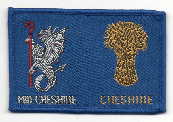 [Mid-Cheshire @ District Badge]