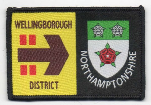[Wellingborough District @ District Badge]