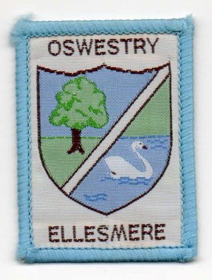 [Oswestry Ellesmere District Badge]