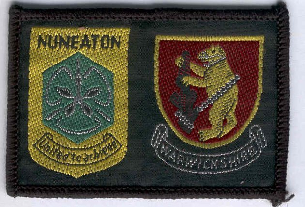 [Nuneaton @ District Badge]