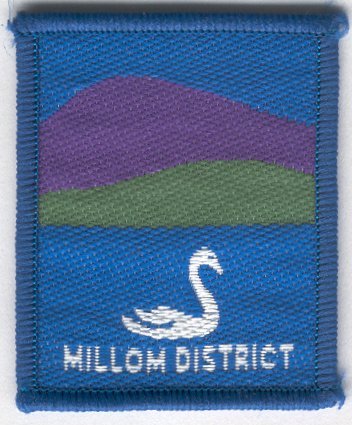 [Millom District Badge]