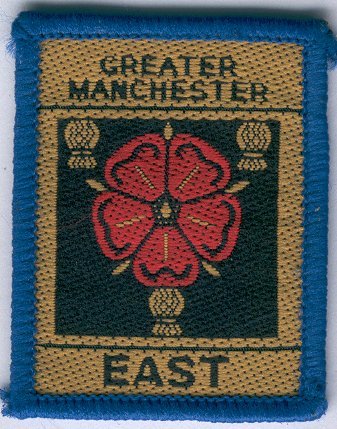 [Greater Manchester East District Badge]