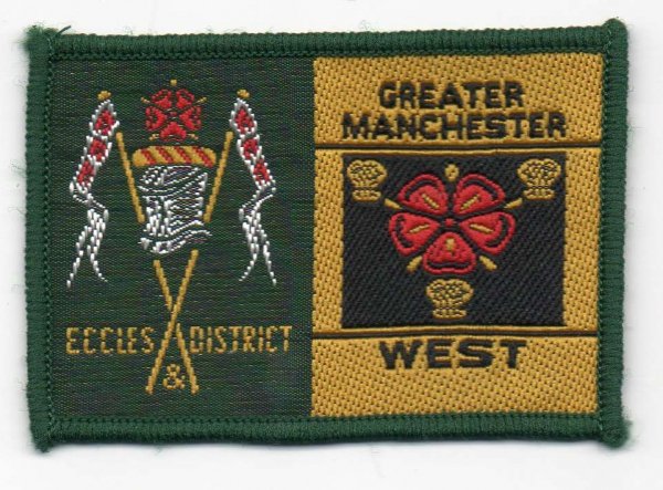 [Eccles & District @ District Badge]